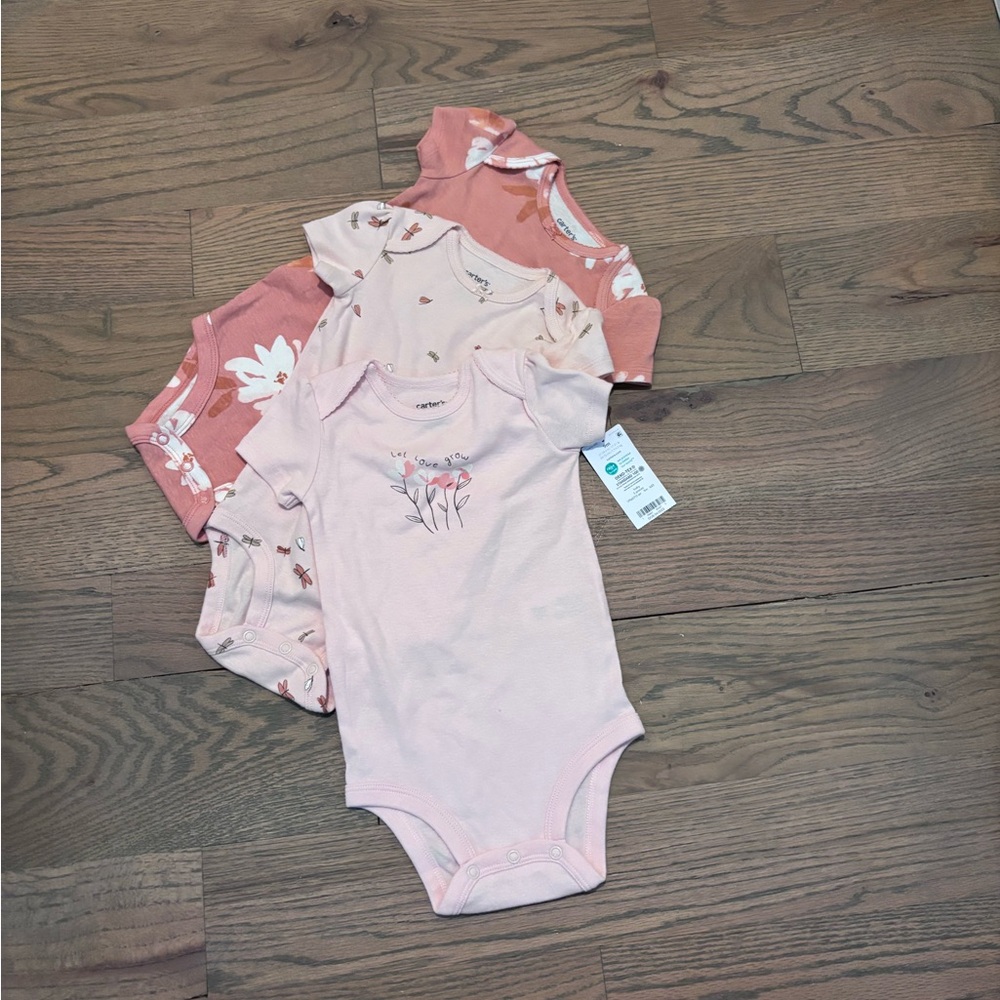 Set of three Carter’s bodysuits